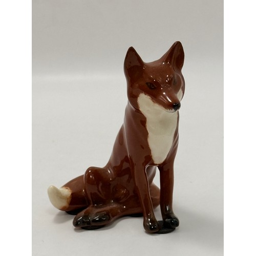 107 - Two Beswick Fox figurines