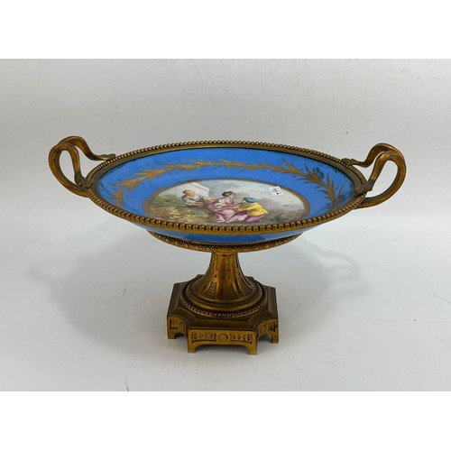 115 - Gilt Bronze-Mounted serves Bleu celeste porcelain tazza D25, candlestick holder plus a paid of Peaco... 