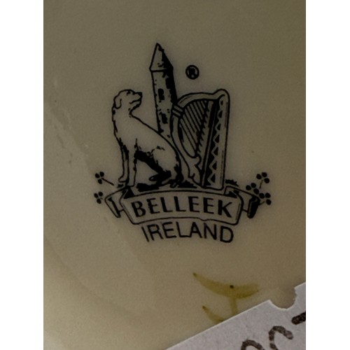 Four Pieces of Belleek pottery - including classic shamrock lidded sugar bow, Creamer Jug, open suga... 