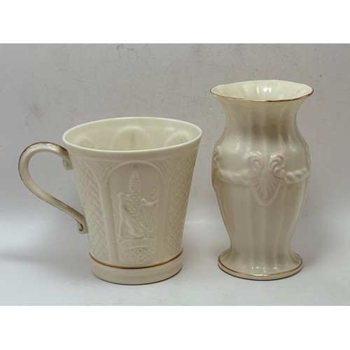  Four pieces of Belleek pottery - Neptune Shell Sugar Bowl and Milk Jug, Sea Shell pink and Cream vas... 