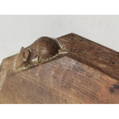 280 - Robert Thompson, a Mouseman oak Octagonal Teapot stand D19cm