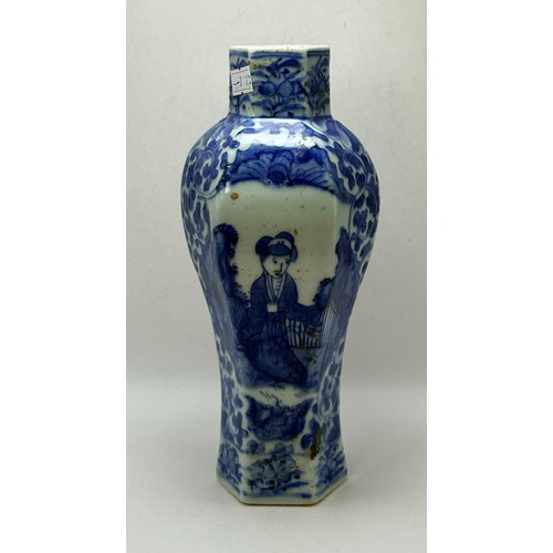  An Antique Qing Chinese Blue and White Vase features six sided baluster profile the vase is adorned ... 