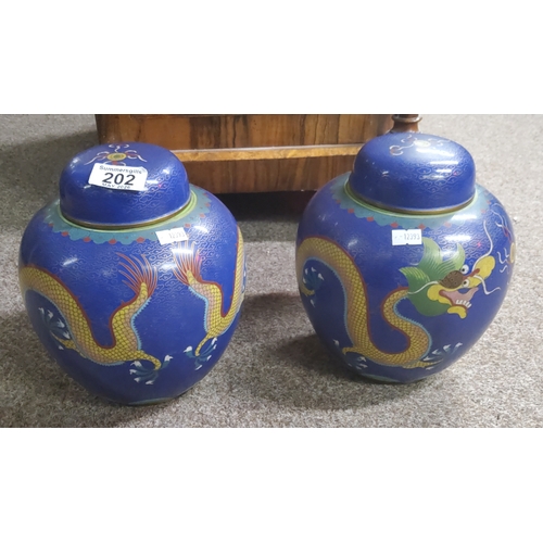  A Pair of Cloisonné Ginger Jars in blue background with dragon design