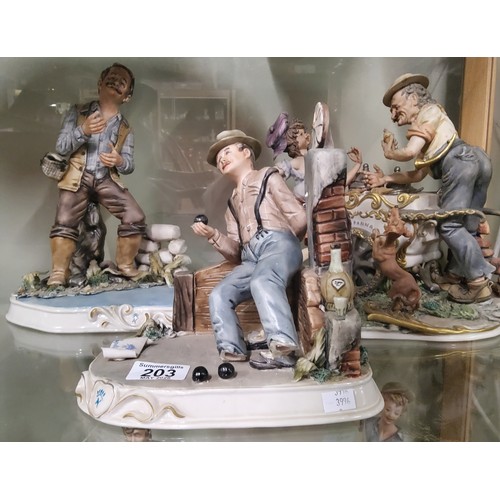 203 - A collection of three Capodimonte figurines