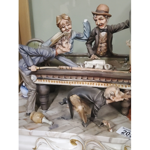  A large Capodimonte figurine depicting a chaotic tavern scene
