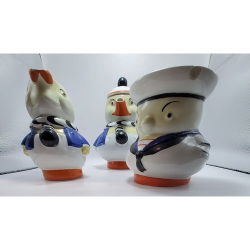 214 - A Shelley Mabel Lucie Attwell Boo Boo Tea Set c1930s in sailor duck design teapot, rabbit milk jug a... 