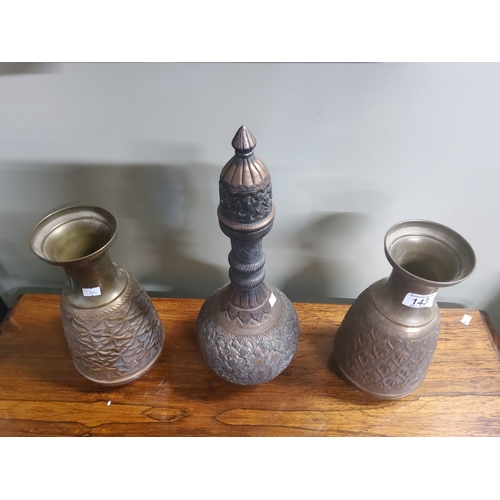 143 - Vintage Middle Eastern copper and brass bottle and two vases H45cm and 28cm