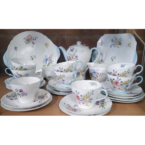 140 - A Shelley Coffee Set Wild Flowers Pattern coffee pot, bread plates x 2, milk jug, sugar bowl , x6 te... 