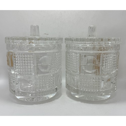  A pair of cut glass storage jars