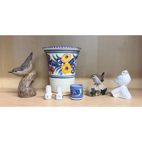 385 - A selection of Poole Pottery items.  Consisting of three birds and a floral designed vase, egg cup a... 