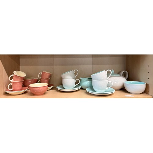 386 - Poole Pottery tea set in twintone Ice Green and Seagull consisting of a teapot, milk jug and sugar p... 