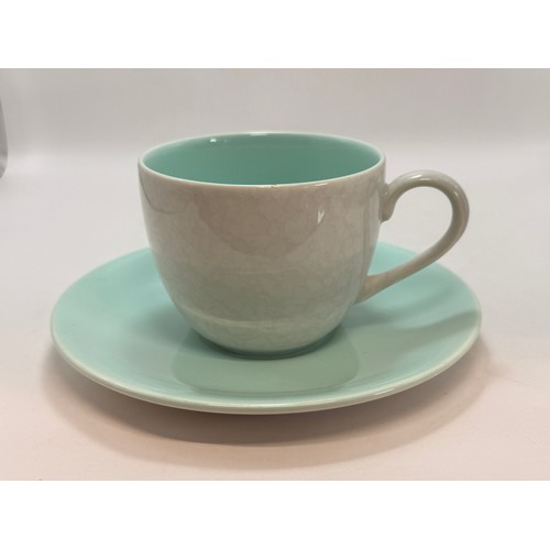 386 - Poole Pottery tea set in twintone Ice Green and Seagull consisting of a teapot, milk jug and sugar p... 