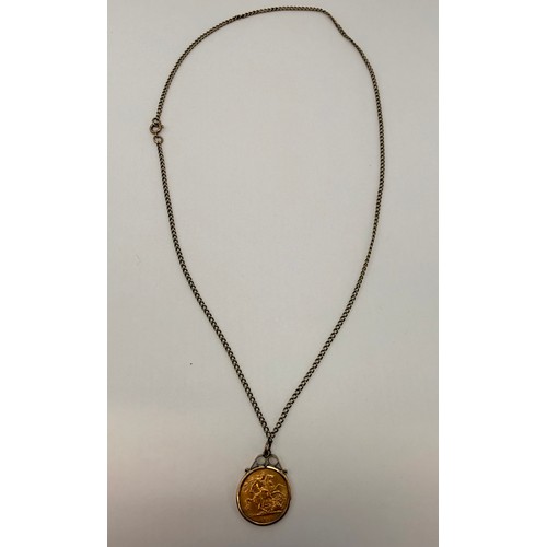  A George V half sovereign, 1915, loose-mounted to a 9 carat gold pendant mount hallmarked London 197... 