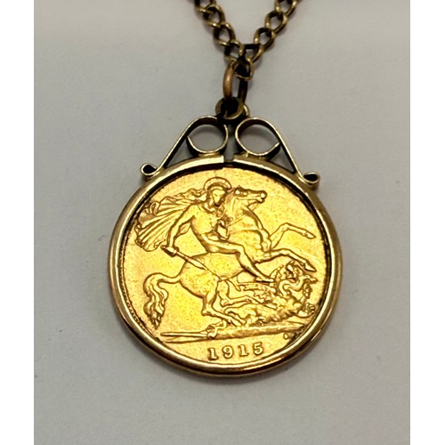  A George V half sovereign, 1915, loose-mounted to a 9 carat gold pendant mount hallmarked London 197... 