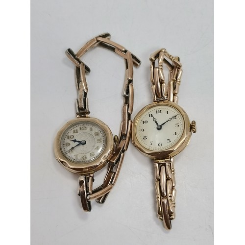 537 - Two 9 carat gold expanding bracelet wristwatches, circular, the first with black Arabic numerals and... 