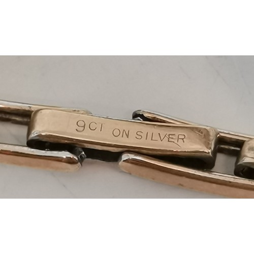 537 - Two 9 carat gold expanding bracelet wristwatches, circular, the first with black Arabic numerals and... 