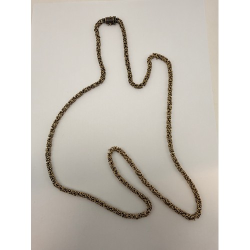  A long 9 carat gold byzantine chain necklace, stamped '9CT' and import hallmarked Sheffield 1979 to ... 
