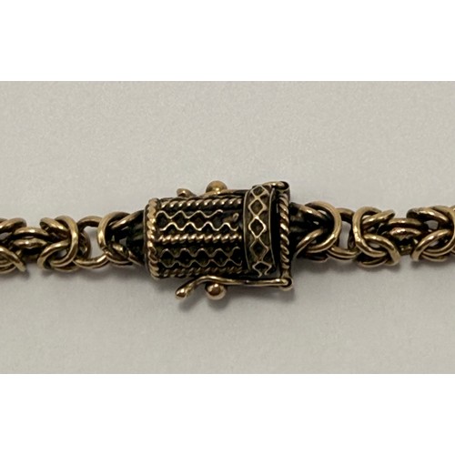  A long 9 carat gold byzantine chain necklace, stamped '9CT' and import hallmarked Sheffield 1979 to ... 