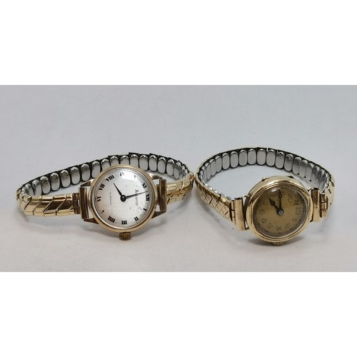  Two lady's gold expanding bracelet wristwatches, the first champagne circular dial with gilt metal A... 