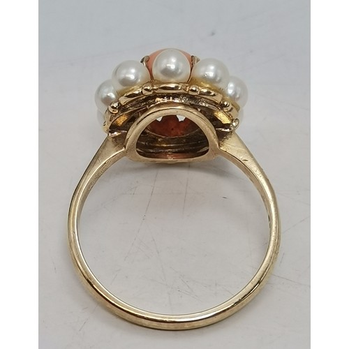  A 9 carat gold fancy pearl ring, the single pearl centred in an openwork twist mount, hallmarked Lon... 