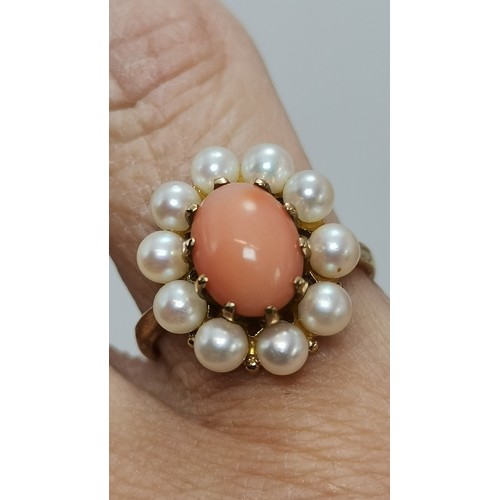  A 9 carat gold fancy pearl ring, the single pearl centred in an openwork twist mount, hallmarked Lon... 