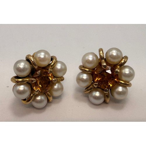 551 - Four pairs of assorted 9 carat gold pearl earrings, comprising a pair of studs, a pair of small pend... 