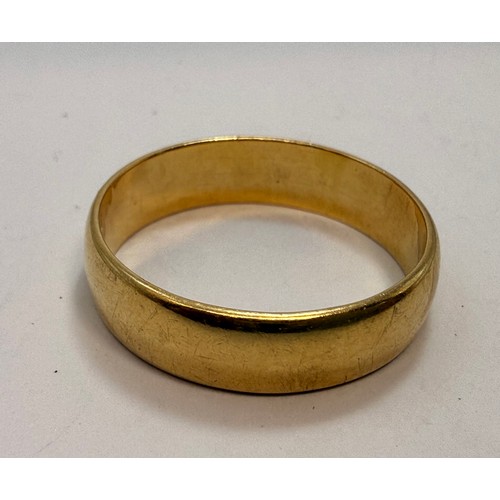  An 18 carat gold wedding band, hallmarked Birmingham 1967. Ring size Y, 7.4g
