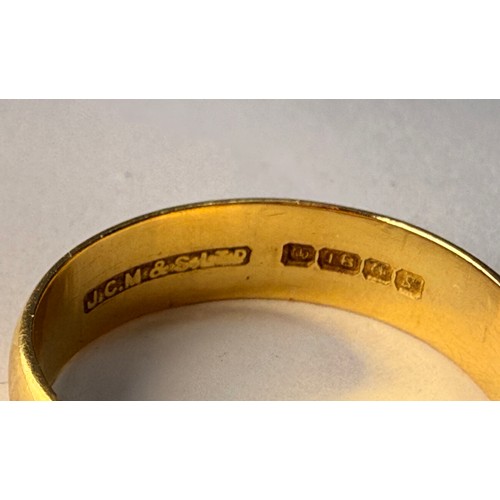  An 18 carat gold wedding band, hallmarked Birmingham 1967. Ring size Y, 7.4g