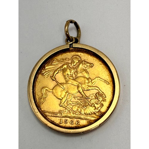 559 - An Elizabeth II sovereign, 1966, loose-mounted to a 9 carat gold pendant mount hallmarked Birmingham... 