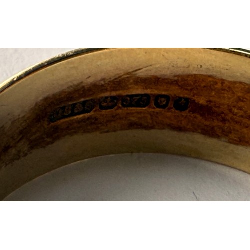  A broad 9 carat gold wedding band, hallmarked London 1981. Ring size W, 5.7g