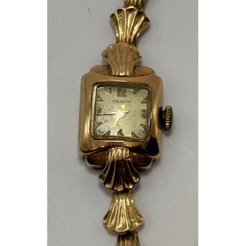  A lady's 9 carat gold fancy link bracelet watch, the square dial signed HELVETIA, with gilt metal Ar... 
