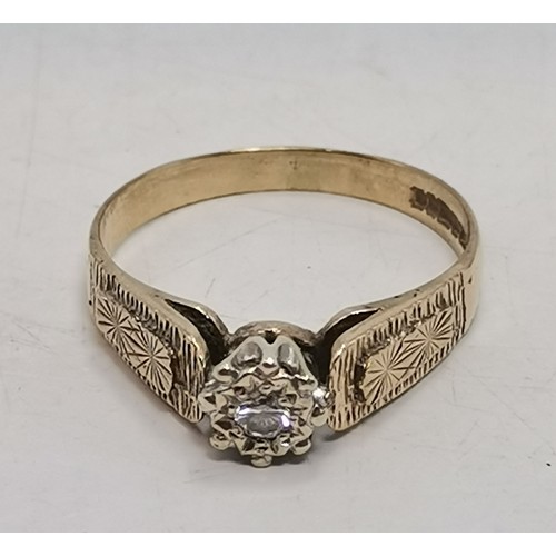  Two 9 carat gold white stone rings, the first a flowerhead cluster of graduated round stones in a ra... 