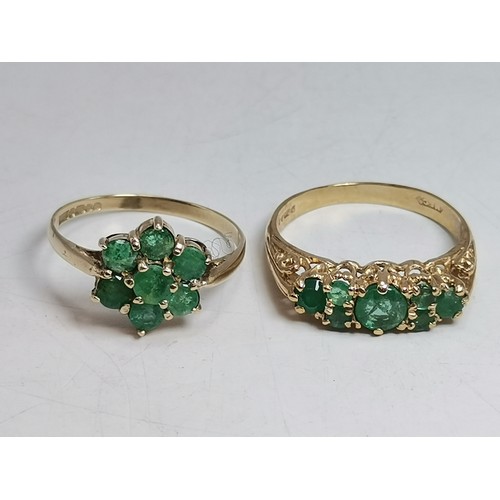 576 - Two 9 carat gold green gemstone rings, the first a flowerhead cluster, hallmarked 375, ring size R1/... 