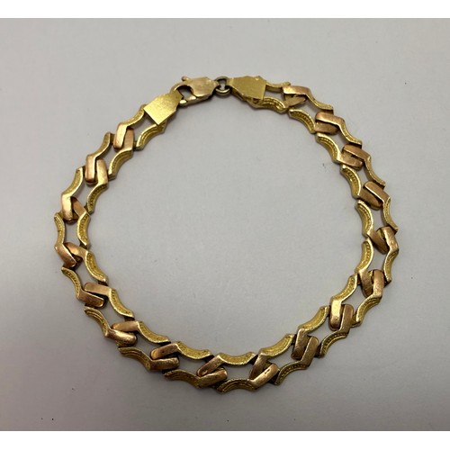  A modernist fancy-link bracelet, elongated octagonal links with shaped and textured sides, stamped '... 