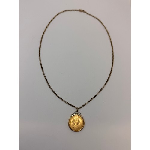  An Elizabeth II sovereign, 1958, loose-mounted to a 9 carat gold pendant mount hallmarked London 9.3... 