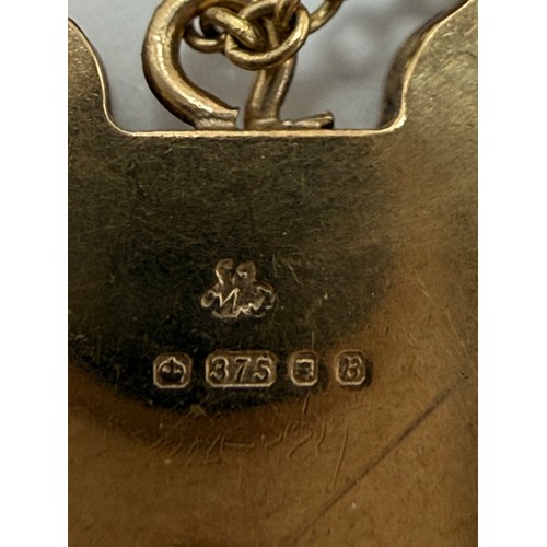 589 - A substantial 9 carat gold curb-link bracelet with heart padlock and dog clip, hallmarked London 197... 