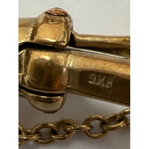 589 - A substantial 9 carat gold curb-link bracelet with heart padlock and dog clip, hallmarked London 197... 