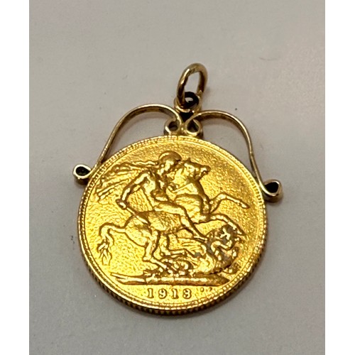 607 - A George sovereign, 1913, to a fixed scrolling pendant mount, unmarked. 8.9g gross