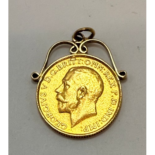 607 - A George sovereign, 1913, to a fixed scrolling pendant mount, unmarked. 8.9g gross