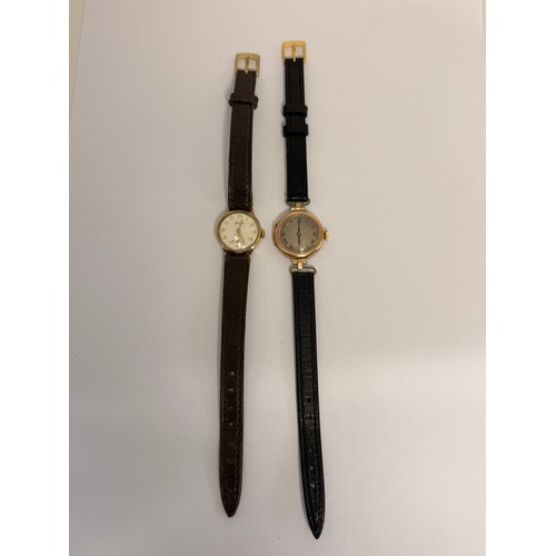  Two 9 carat gold-cased lady's leather strap wristwatches, the first with silvered circular dial sign... 