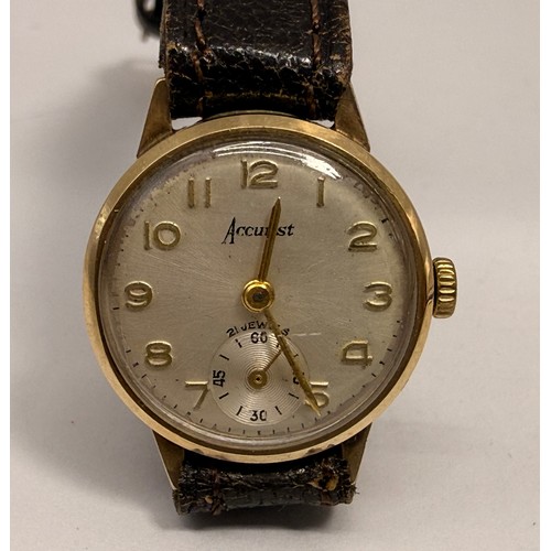  Two 9 carat gold-cased lady's leather strap wristwatches, the first with silvered circular dial sign... 