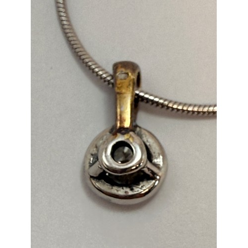  An 18 carat white gold diamond pendant necklace, the round stone in an openwork pendant mount, both ... 