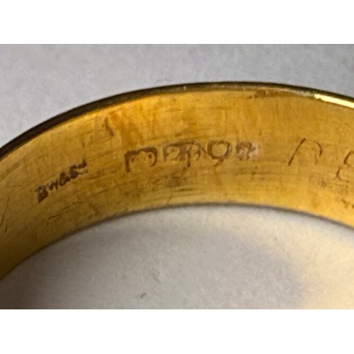 620 - A 22 carat gold wedding band, hallmarked London 1964. Ring size S, 5.9g