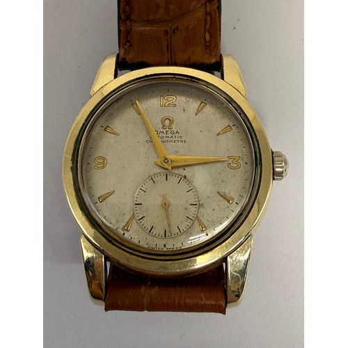 623 - A gent's gold-plated Omega Automatic Chronometre strap watch, the silvered circular dial signed, wit... 