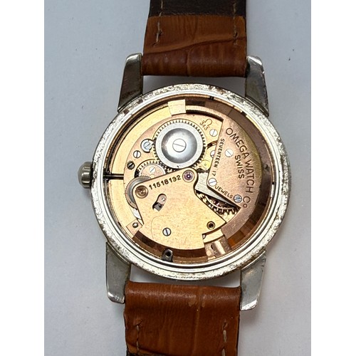 623 - A gent's gold-plated Omega Automatic Chronometre strap watch, the silvered circular dial signed, wit... 