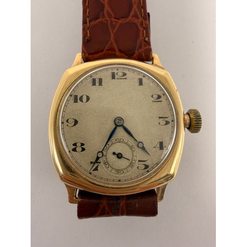 624 - A gent's 9 carat gold watch, 1930s, the unsigned circular dial with Arabic numerals and blued steel ... 