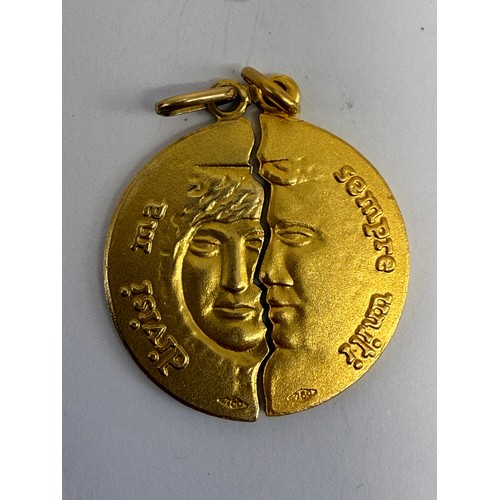 626 - A lovers/friendship pendant, circular, in two halves with faces, 'Divisi Ma Sempre Uniti' (Divided b... 
