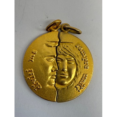 626 - A lovers/friendship pendant, circular, in two halves with faces, 'Divisi Ma Sempre Uniti' (Divided b... 