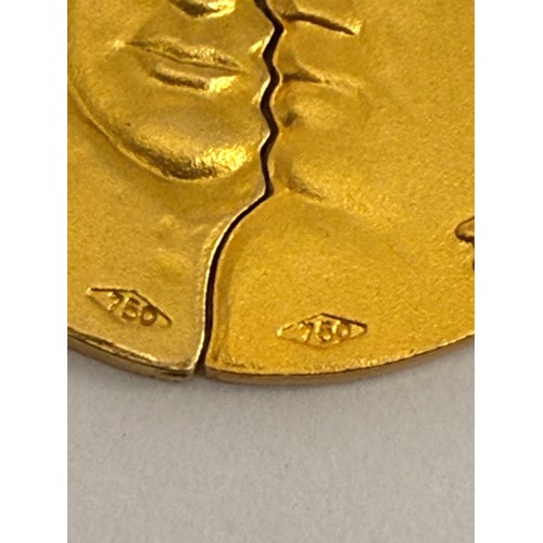 626 - A lovers/friendship pendant, circular, in two halves with faces, 'Divisi Ma Sempre Uniti' (Divided b... 