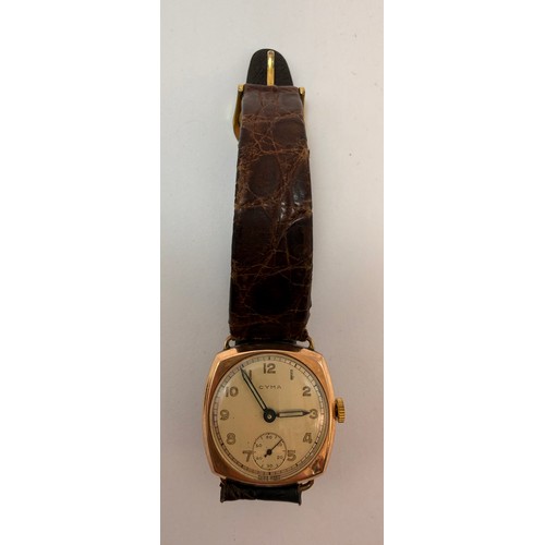  A gent's 9 carat gold-cased leather strap wristwatch, the circular dial signed CYMA, with luminous A... 